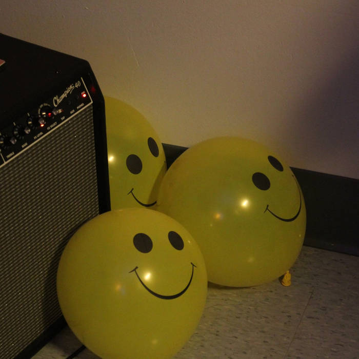 demoz for the delinquents album cover of three yellow smiley baloons in front kittys amp